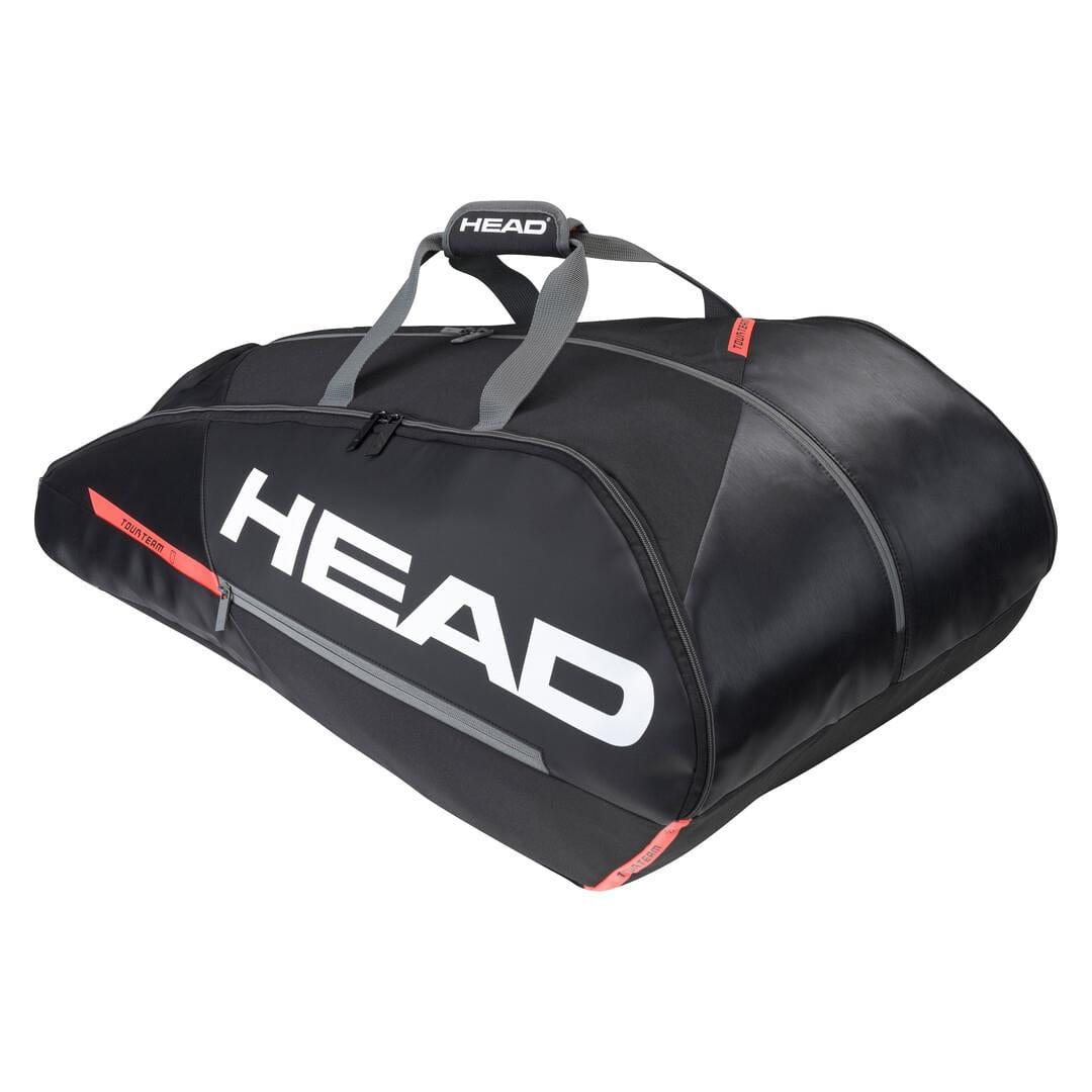 The HEAD Tour Team 12R Monstercombi Badminton Bag in black and orange, featuring Climate Control Technology, prominently displays "HEAD" in large white letters on the side. It includes two handles, orange accents, and a spacious compartment design ideal for carrying sports equipment or up to 12 rackets.