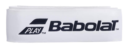 A close-up of the Babolat Syntec Team X1 Replacement Badminton Grip in white features the Babolat logo printed in black, offering maximized feel for players. The word "Play" is accompanied by a small diagonal design on the left side, emphasizing its thin grip for enhanced racket feedback.