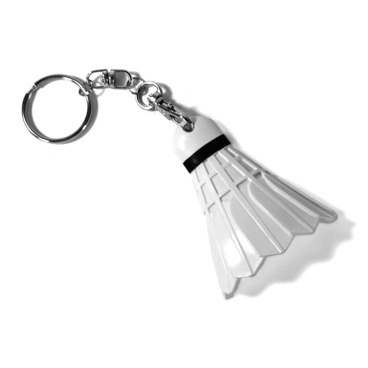 The Yonex AC0001AE Shuttle Keychain, designed for badminton enthusiasts, features a white shuttlecock inspired by the Yonex brand, complete with a stylish metal ring and short chain attachment. Its clever design is enhanced by a black band detail that adds an authentic touch.