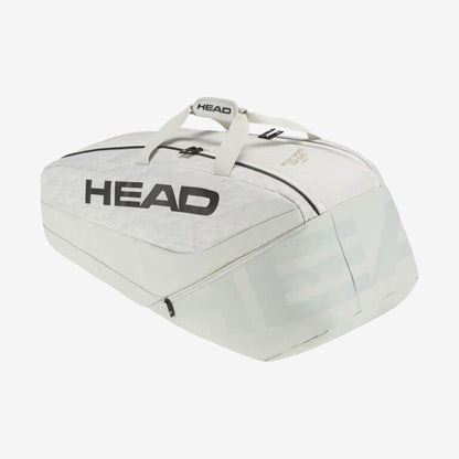 The stylish HEAD Pro X Racket Bag - L - YUBK, featuring the "HEAD" logo prominently displayed in bold black letters, is perfect for transporting sports equipment. Its zipper closure and dual handles make it as dependable as the versions used by Novak Djokovic to boost his court performance.