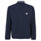 This Tecnifibre Men's Light Badminton Jacket - Marine is a navy blue zip-up with a high collar, long sleeves, and a small white logo on the left chest. It boasts a simple, sleek design and is made from 4-way stretch fabric that is both windproof and water-repellent.