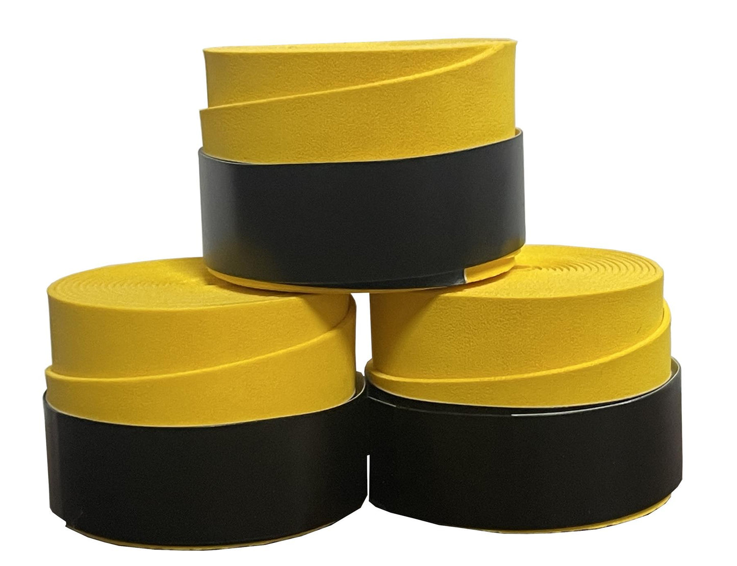 A set of three rolls of Badminton HQ's Badminton Overgrip in yellow, arranged in a triangular stack, resembles premium badminton overgrips. Each roll is slightly unwrapped, showcasing the exceptional comfort of the yellow surface paired with a durable black backing against a white background.