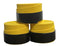 A set of three rolls of Badminton HQ's Badminton Overgrip in yellow, arranged in a triangular stack, resembles premium badminton overgrips. Each roll is slightly unwrapped, showcasing the exceptional comfort of the yellow surface paired with a durable black backing against a white background.