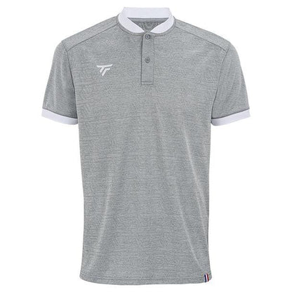 The Tecnifibre Men's Team Badminton Mesh Polo Shirt in Silver provides superior breathability, featuring a classic white collar and sleeve cuffs. It is adorned with a subtle logo on the left chest and a small tricolor tag at the hem, crafted from high-quality polyester mesh for enhanced comfort.