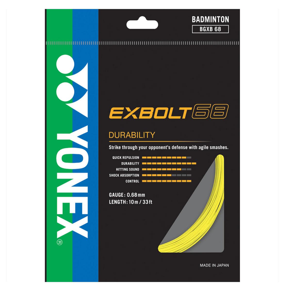 The image displays the Yonex Exbolt 68 Badminton String Yellow - 0.68mm in a 10m packet, with packaging chiefly in black adorned with blue and green accents. It prominently features "EXBOLT 68" in bold letters, emphasizing its durability and potential for enhanced smashing power. Within, the yellow string made from FORGED FIBER is neatly coiled, showcasing its Japanese craftsmanship.