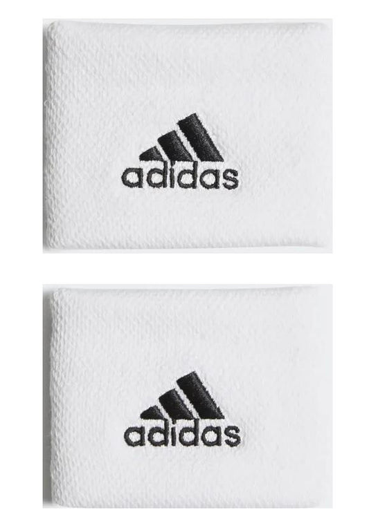 A pair of white Adidas Wristband Sweatband Small - White featuring the brand's iconic black logo. The design includes three diagonal stripes above the adidas name. These textured and soft, moisture-absorbing wristbands are perfect for staying dry on the court.