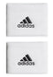 A pair of white Adidas Wristband Sweatband Small - White featuring the brand's iconic black logo. The design includes three diagonal stripes above the adidas name. These textured and soft, moisture-absorbing wristbands are perfect for staying dry on the court.