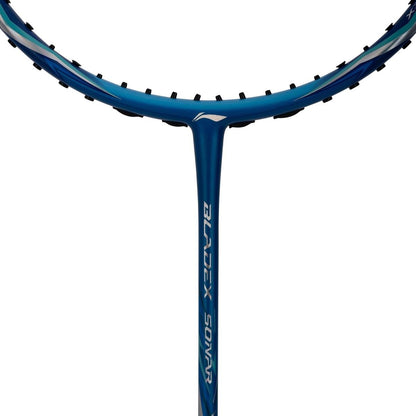 Close-up of a blue Li-Ning BladeX Sonar 3U badminton racket, tailored for intermediate players, highlighting the frame and strings. The brand name "BLADEX SONAR" is displayed on the shaft. Featuring a shock absorption system, the strings are tensioned with small black grommets against a white background.