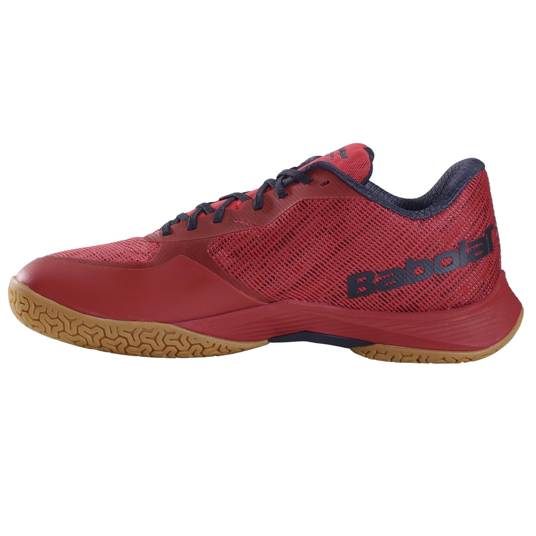 The Babolat Shadow Spirit 2 Men's Badminton Shoes in Black and Poppy Red feature a breathable mesh upper and a gum sole. They are lightweight, comfortable, and suitable for both tennis and badminton. The side profile of the shoes is showcased against a plain white background.