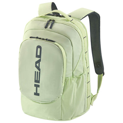 A light green HEAD Pro 30L Badminton Backpack - LLAN with bold black "HEAD" lettering on the front pocket. Made from durable ripstop fabric, it features multiple compartments, a shoe compartment, black zippers, and adjustable shoulder straps with black padding.