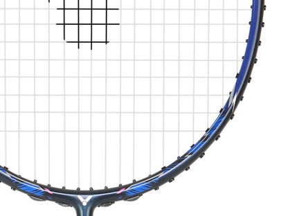 Close-up of a badminton racket featuring a sleek black and blue frame. The strings are arranged in a grid pattern, which is displayed against a light backdrop. Accents of blue and pink highlight the edges of the racket, evoking the Victor Auraspeed 90K II TD 3U Badminton Racket - Midnight Blue by Victor, known for its Dynamic Sword technology that boosts performance.