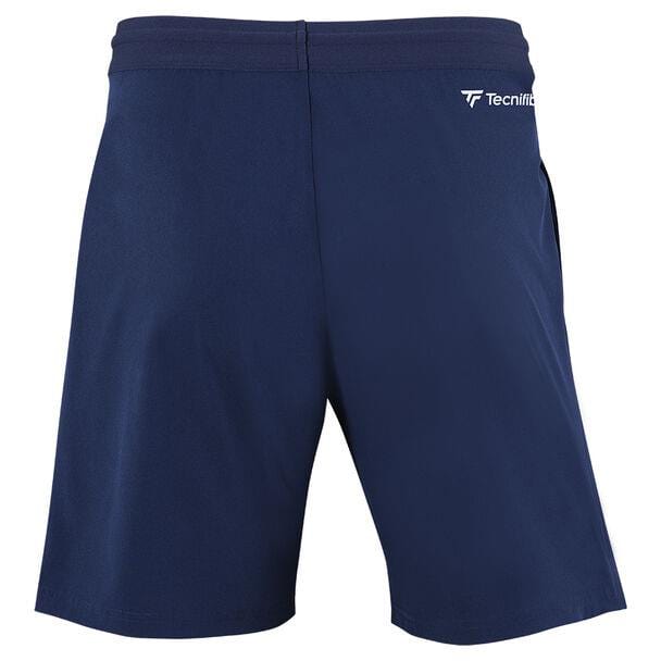 The Tecnifibre Men's Team Badminton Short in Marine is shown from the back, highlighting excellent ventilation and a subtle Tecnifibre logo on the waistband.