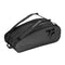 The Tecnifibre Tour Endurance 2024 12 Racket Badminton Bag in Ultra Black is made from durable tarpaulin fabric and features two compartments along with adjustable shoulder straps. It prominently displays the iconic Tecnifibre logo and name on the side, highlighting its capacity to hold up to 12 rackets.