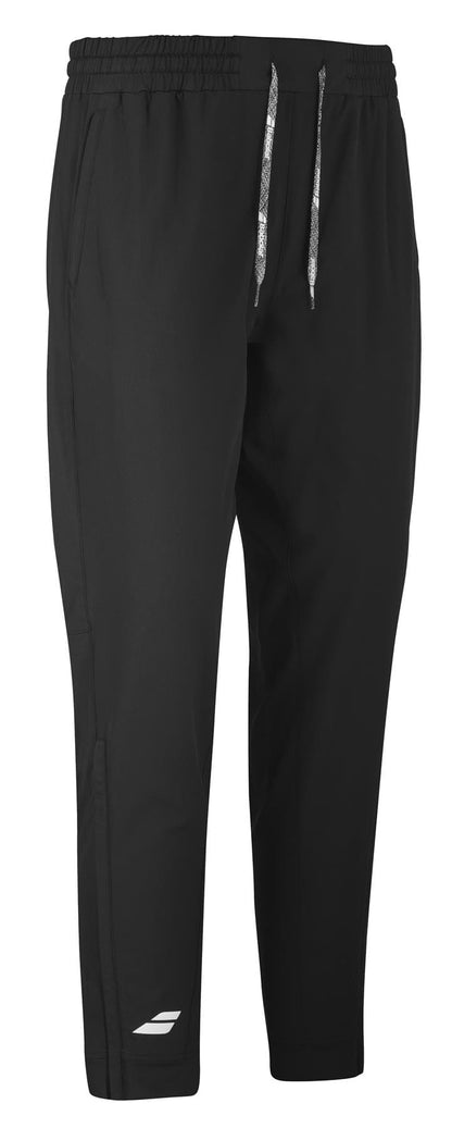 Babolat Play Men's Badminton Pants in black are made from Fiber Dry material, featuring an elastic waistband with white drawstrings for a secure fit. With a 360 Motion design, these pants ensure unrestricted movement and display a small white Babolat logo near the ankle.