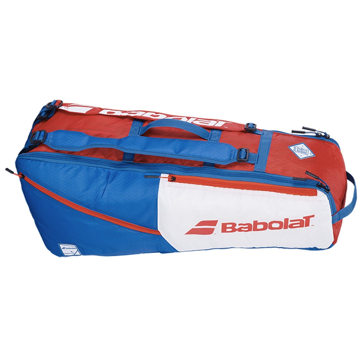 The Babolat RH6 Evo Drive Badminton 6 Racket Bag in white, blue, and red is ideal for carrying tennis equipment. This bag, designed by Babolat, includes zippered compartments, a convenient carry handle, and can accommodate up to 6 rackets. The brand logo is prominently displayed on the side.