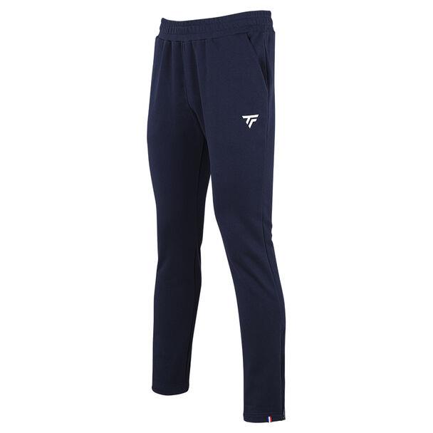 The Tecnifibre Unisex Team Badminton Pants in Marine offer a stylish athletic look with their dark blue color and tapered fit. Featuring an elastic waistband for comfort and a subtle logo on the upper left thigh, these pants embody a minimalist design with a technical edge, ideal for casual wear or warm-ups.