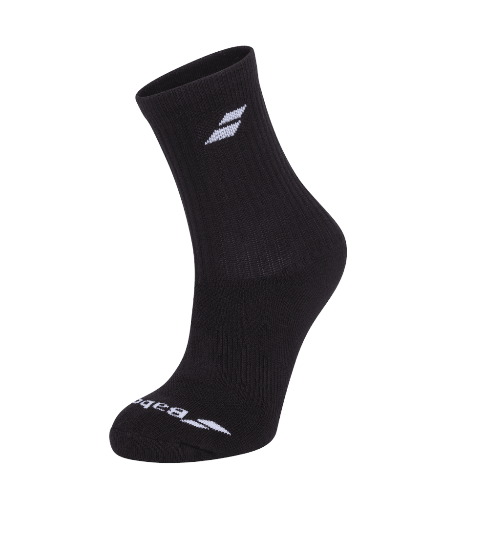 The Babolat Long Badminton Socks - Black 3 Pack features ankle-length socks with a ribbed texture designed for comfort and breathability. These black socks, showcasing a white logo on the side and toe area, are displayed upright against a plain white background.