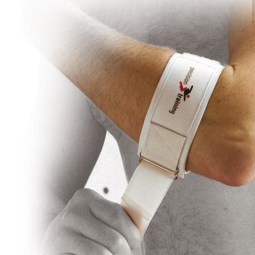 A person securing a white Precision Tennis Elbow Strap around their wrist. Crafted as a lightweight compression accessory, the strap features the "Precision" logo with a subtle red and black design, making it ideal for preventing overuse injuries. The image is partially faded on the left side.