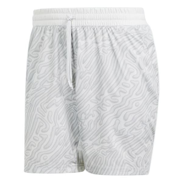 The ADIDAS Melbourne Men's Pro 7 Inch Badminton Shorts in grey showcase a subtle wavy design. Made from recycled polyester, these shorts are equipped with an elastic waistband and drawstring for a tailored fit, featuring HEAT.RDY technology to ensure you stay cool and comfortable.