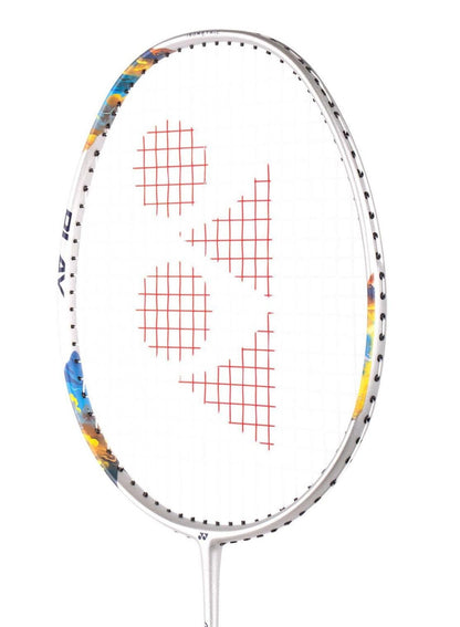 A close-up of a Yonex Nanoflare 700 Play 4U badminton racket by Yonex, featuring a silver frame with sky blue accents. The strings create a geometric pattern in red, making it an excellent choice for beginner players. The background is plain white.