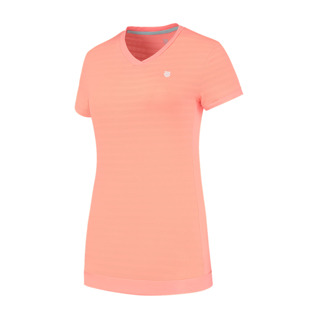 Introducing the K-Swiss Tac Hypercourt Women's V-Neck Badminton Top in Desert Flower, a stylish and comfortable sportswear shirt adorned with a white logo. This top is perfect for women who value both fashion and functionality, whether you’re playing on the badminton court or enjoying a laid-back day out.