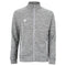 The Tecnifibre Men's Team Badminton Jacket in silver is a zip-up athletic garment featuring a high collar and subtle horizontal pattern. Made from breathable and stretchy polyester double mesh fabric, it has a small white Tecnifibre logo on the left chest, along with white accents on the zippers of its two side pockets.