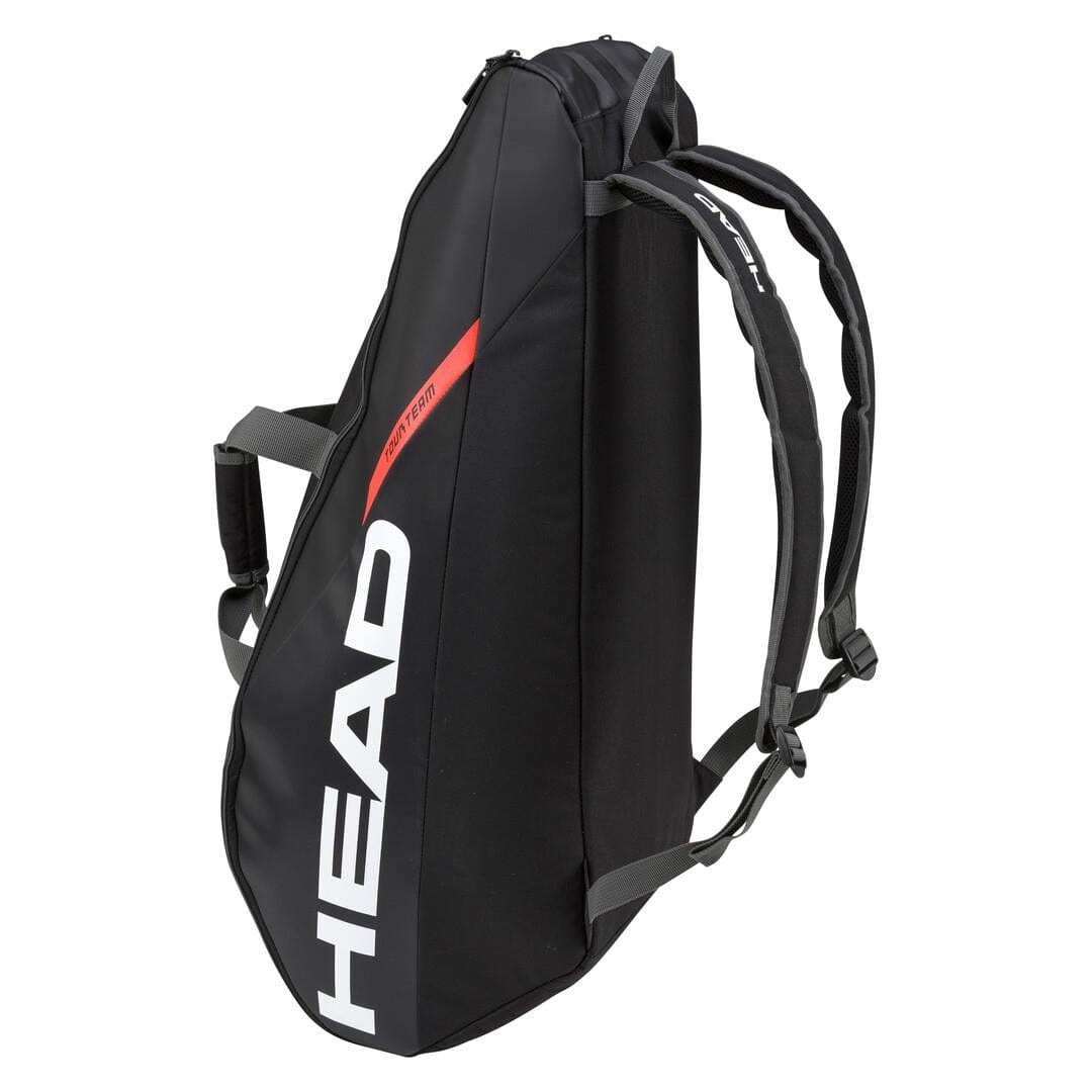 HEAD Tour Team 6R Combi badminton bag in black and orange, adorned with the iconic white logo. It features adjustable shoulder straps and a sleek aerodynamic design, accommodating up to 6 rackets and gear while incorporating climate control technology for optimal protection.