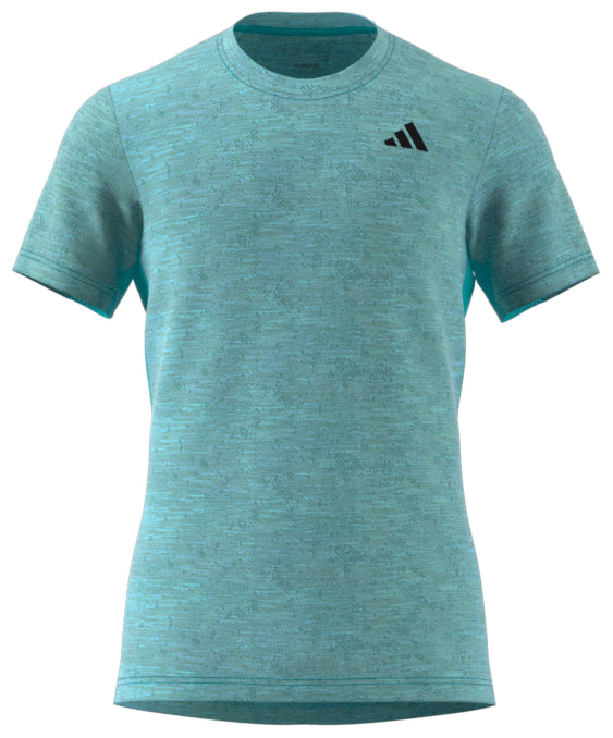 This ADIDAS Mens Freelift Badminton T-Shirt in blue, designed with moisture-absorbing technology, showcases a subtle textured pattern and a small black logo on the chest. It is displayed against a plain white background, reflecting the dynamic style of adidas.