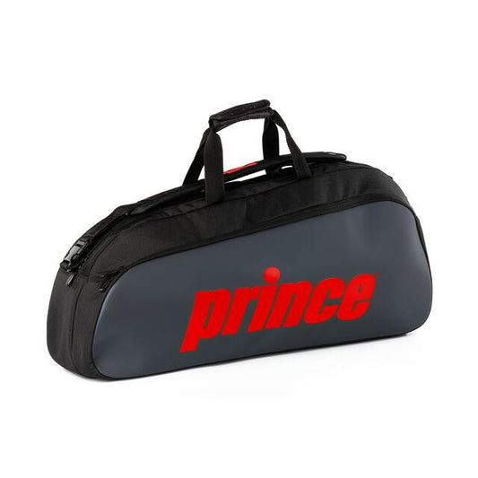 This stylish badminton bag from the Prince Tour collection, featuring a sleek black and grey design with "Prince" in bold red letters, is perfect for avid players. The Prince Tour 1 Comp 3 Racket Badminton Bag includes dual handles and a zipper closure, making it an ideal choice.