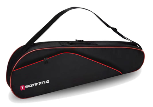 A BadmintonHQ 3 Racket Badminton Bag in black and red, made from premium 600D Polyester, is showcased on a white background. It features a shoulder strap and zipper closure, with the BadmintonHQ logo and text prominently displayed in white on its side.