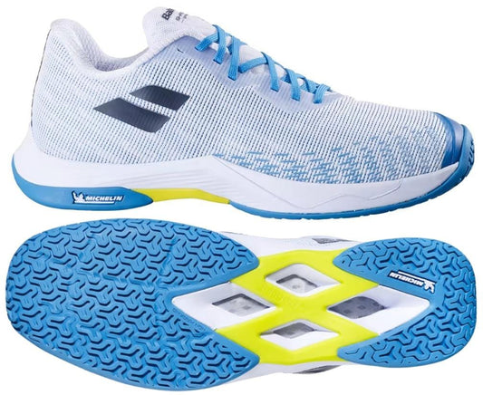 The Babolat Shadow Spirit 2 Mens Badminton Shoes in White/Algier Blue are shown from the side and bottom, highlighting their textured Michelin outsole with blue rubber grip and yellow accents.