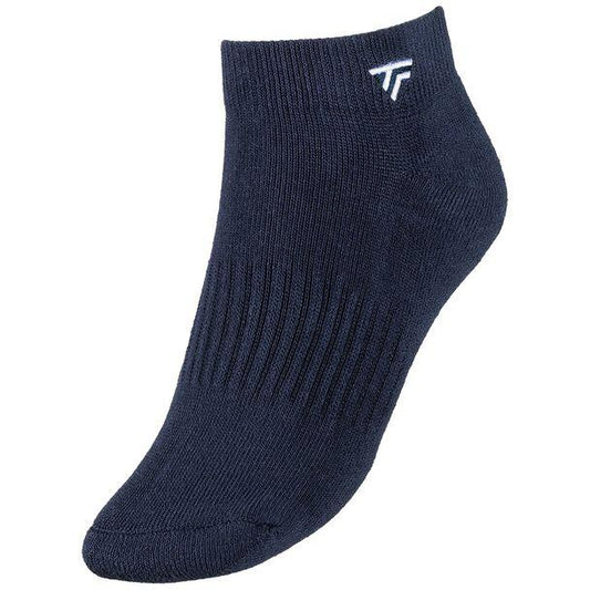 The Tecnifibre Low Cut Badminton Socks (3 Pack) in marine, designed with a ribbed texture and a small white logo near the cuff, offer added ankle support for racket sports enthusiasts.