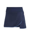 The ADIDAS Women's Club Badminton Skirt - Navy by adidas showcases a chic wrap-around design accentuated by a light blue trim. It incorporates AEROREADY technology alongside practical built-in short tights for ultimate comfort and performance. The skirt's fitted waist and diagonal layered hem provide a flattering appearance.