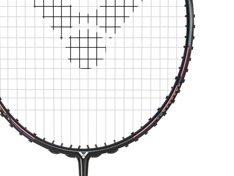 A close-up of the Victor Auraspeed HS Plus 4U Badminton Racket in black showcases its white strings and black frame. The grid pattern emphasizes the WES 3.0 technology, while a portion of the handle displaying the anti-torsion system is visible at the bottom.