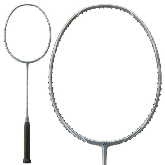 The Yonex Astrox Nextage 4U Badminton Racket boasts a light grey design with a black grip, ideal for intermediate players. Its circular frame stands out against a white background, showcasing its sleek style even without strings.