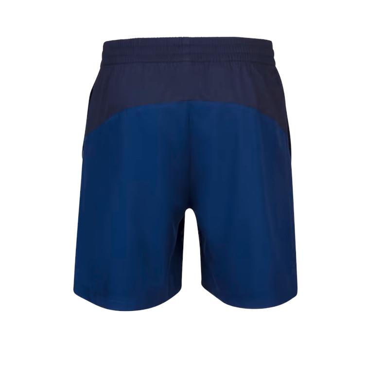 Rear view of Babolat Play Men's Shorts - Estate Blue with a black waistband. Created using Fiberdry fabric, these shorts by Babolat provide 360 Motion flexibility, making them ideal for both athletic activities and everyday wear.