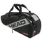 Introducing the HEAD Team 6 Racket Badminton Bag M - BKCC by HEAD, a sleek and modern badminton bag crafted from recycled materials. This black and gray bag is emblazoned with "HEAD" and "TEAM" logos, and features a convenient 2-way carry system, sturdy handles, and a zippered compartment – ideal for effortlessly transporting your badminton equipment.