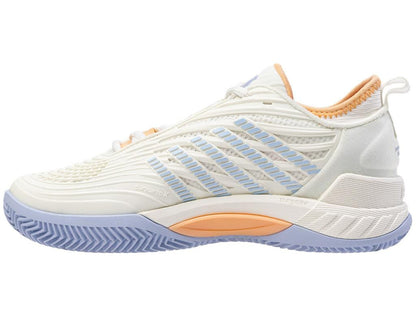 Side view of the K-Swiss Hypercourt Supreme 2 HB Women's Badminton Shoes in Star White/Heather, showcasing a white athletic design accented with light blue and orange. These shoes feature a textured sole, Dragguard 7.0, and Durawrap X for enhanced durability, along with diagonal stripe details on the sides that add a sporty and modern appeal.