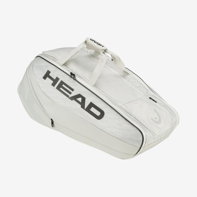 The HEAD Pro X Racket Bag - XL in the YUBK design, championed by Novak Djokovic, is distinguished by its striking black branding and CCT+ climate control technology. It is equipped with several zippered compartments and two sturdy carrying handles for added convenience.