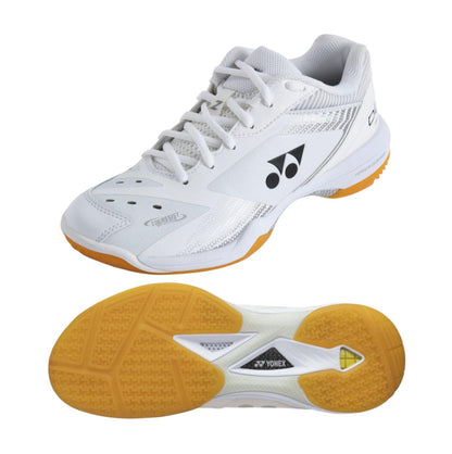 The Yonex Power Cushion 65Z3 Women's Badminton Shoes in white showcase a distinct black logo on the side and feature a gum-colored sole. With Yonex Power Cushion technology, they provide an exceptionally comfortable fit, making them perfect for badminton. Their sporty design includes multiple perforations and a textured outsole to enhance grip.