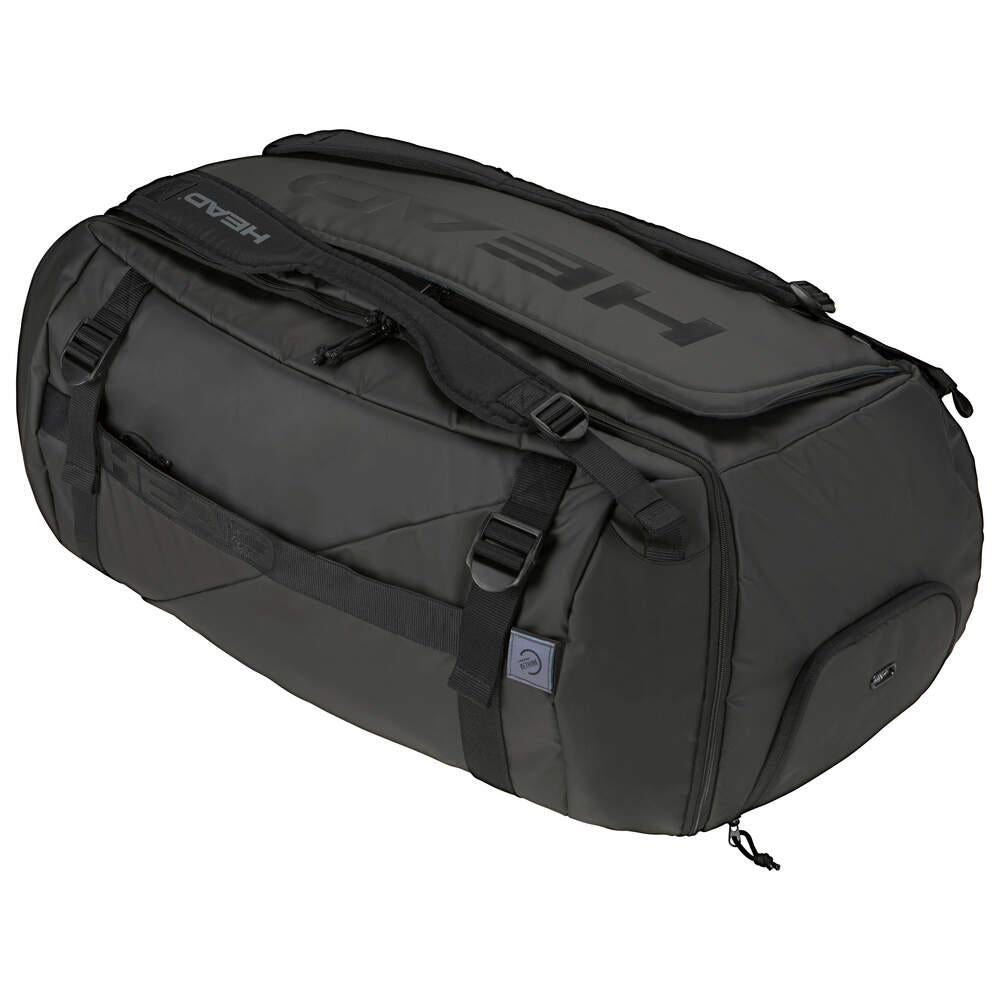 The HEAD Pro X Duffle Bag XL - Black, featuring the iconic "HEAD" logo, is designed for eco-conscious users with its multiple compartments, robust zippers, and adjustable straps. Perfect for travel or carrying sports gear, it keeps your essentials organized and secure for any adventure.