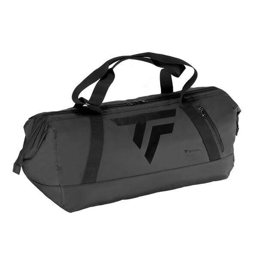 The Tecnifibre Tour Endurance Badminton Duffle Bag in Ultra Black, featuring an angular logo, robust handles, and a durable waterproof design, is the perfect choice for athletes. It seamlessly combines style and functionality, making it an excellent option for active individuals.