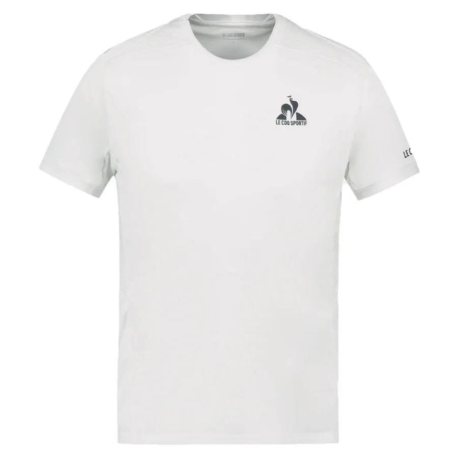 The Le Coq Sportif Pro Men's Badminton T-Shirt in Optical White, from the K-Swiss brand, showcases a minimalist design with a small "Le Coq Sportif" logo on the upper left chest. Made from breathable polyester, it features a stylized rooster and is designed with short sleeves to highlight simplicity, comfort, and ease of movement.