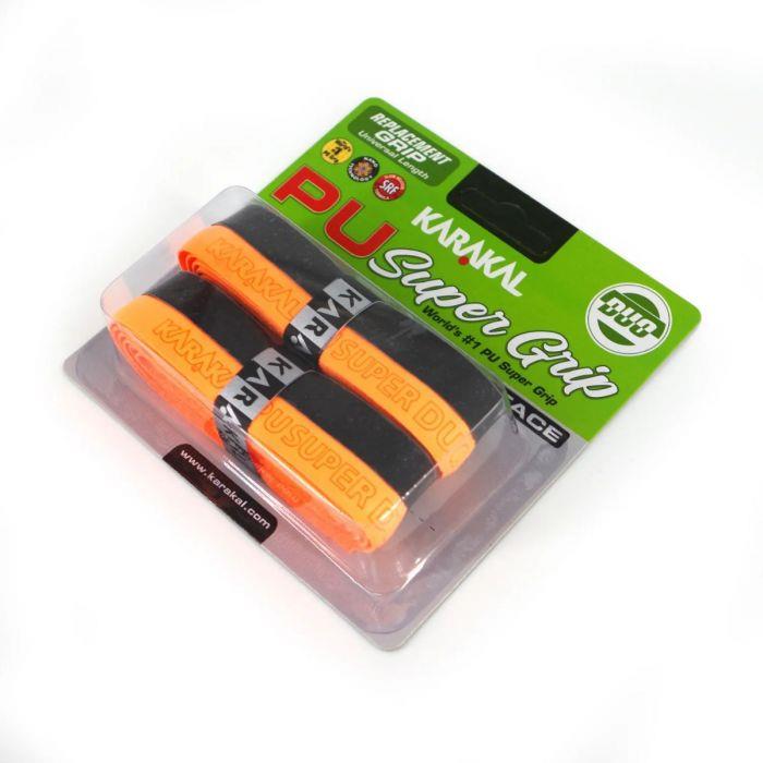 Karakal PU Duo Badminton Grip - Twin Pack packaging, which includes two black and orange grips, ideal for badminton players. The package is branded with the Karakal logo and features "Karakal" and "PU Duo Badminton Grip" prominently displayed.