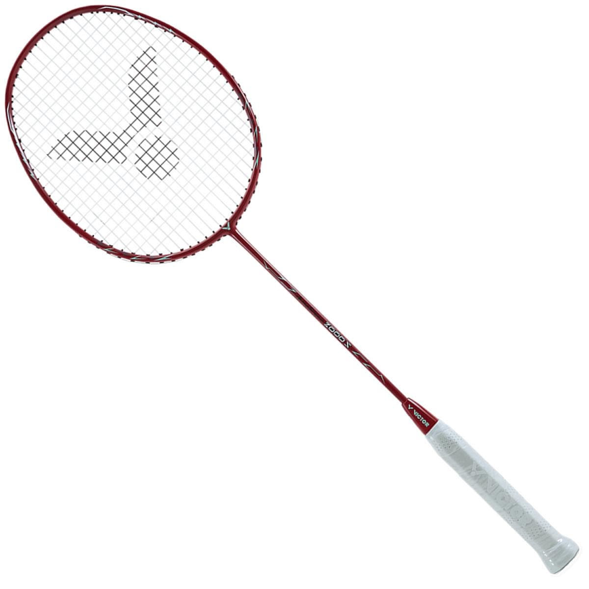 A Victor Auraspeed 3000S Badminton Racket, designed by Victor in a striking red color, comes with a white grip handle and the logo intricately patterned on the strings. It features an isometric racket head, ideal for intermediate-level players, and is showcased against a white background.