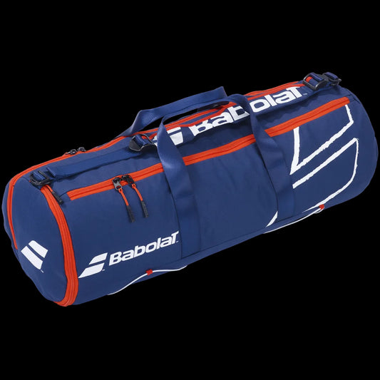 A blue Babolat Duffle Rack badminton bag with red zippers and white logo accents, featuring dual handles, a spacious cylindrical shape, and a dedicated racket compartment, set against a black background.