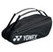 The Yonex 42326EX 6 Piece Racket Bag in black offers two zippered compartments and adjustable shoulder straps, showcasing the iconic Yonex logo in white on the side.