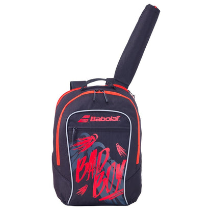 The Babolat Kids Badminton Backpack in black and red, prominently features "BAD BOY" in red letters. This stylish backpack includes a dedicated racket compartment at the top, making it an essential training gear for young athletes.