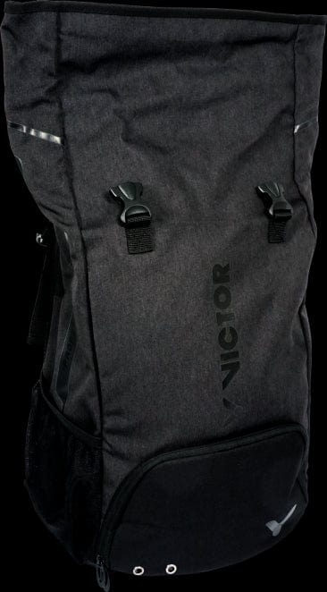 The Victor 9101 Rucksack Badminton Bag in black by Victor boasts a sleek, minimalistic design with "Victor" printed vertically in dark letters. It includes two adjustable clasps on the front, a mesh side pocket, a reinforced bottom, and separate compartments for shoes and rackets for added convenience.