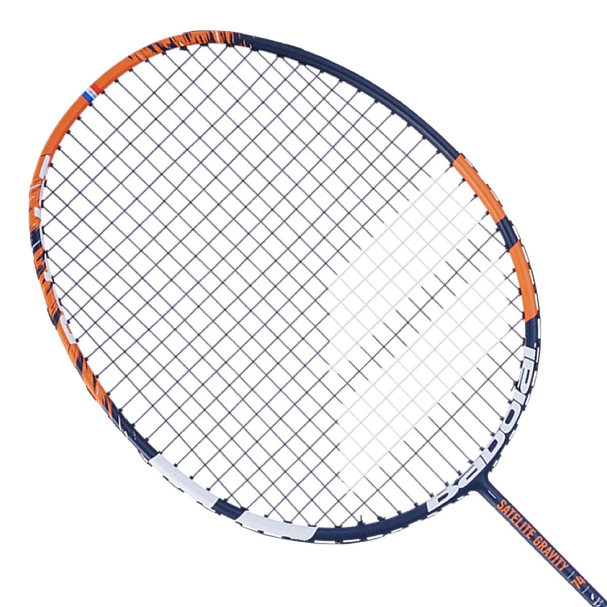 The Babolat Satelite Gravity 74 badminton racket, in a vibrant orange hue, showcases an ultra-lightweight frame complemented by navy blue accents and white strings, making it perfect for defensive players who prioritize agility and precision.